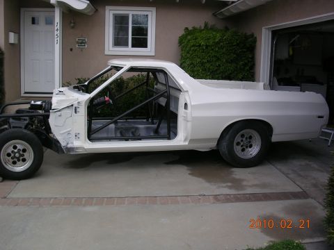 1972 Ford Ranchero - This vehicle is undergoing modifications, with its interior gutted and a roll cage installed.