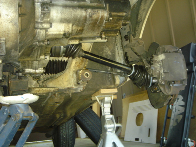 Underside of a front-wheel-drive transaxle, CV axle and brake