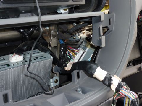 2002 Toyota Sequoia - Close-up view of a vehicle's interior wiring harness and dashboard components.
