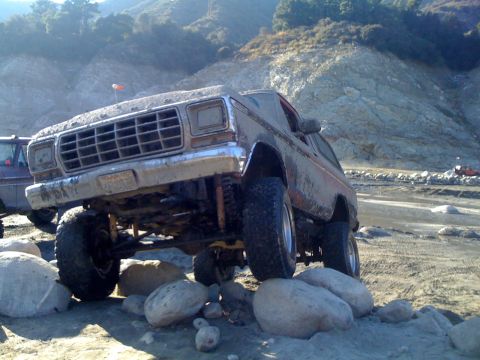 1978 Ford Bronco - A 1978 Ford Bronco navigates a rocky off-road course.