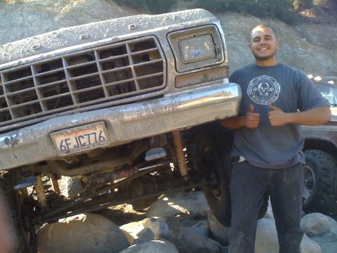 1978 Ford Bronco - A man gives two thumbs up next to a muddy 1978 Ford Bronco with a California license plate reading "6F JC776". The vehicle appears to be of…