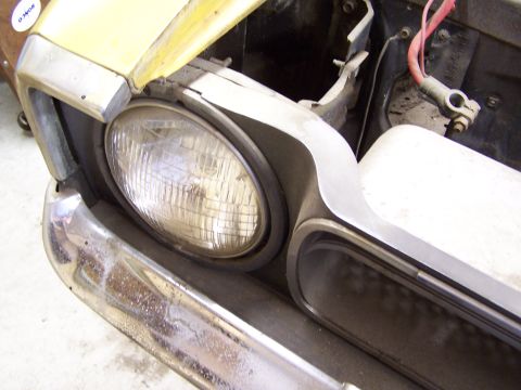 1972 Ford Mustang - Close up of the right headlight and bumper.