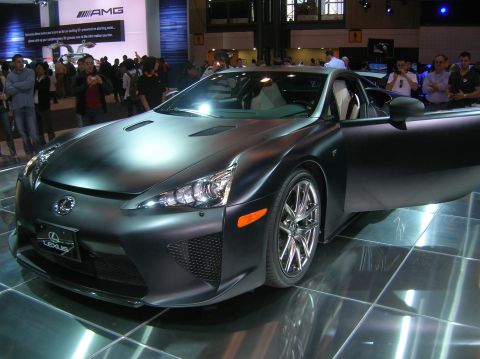 1996 Ford Bronco - A black Lexus LFA is displayed with its driver's door open, its interior and design.