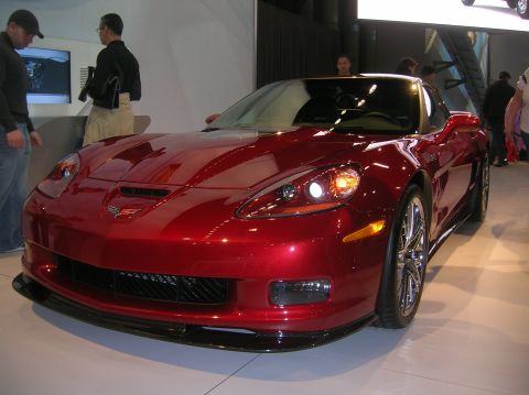 1996 Ford Bronco - Front view of a red sports car on display, likely at an auto show.