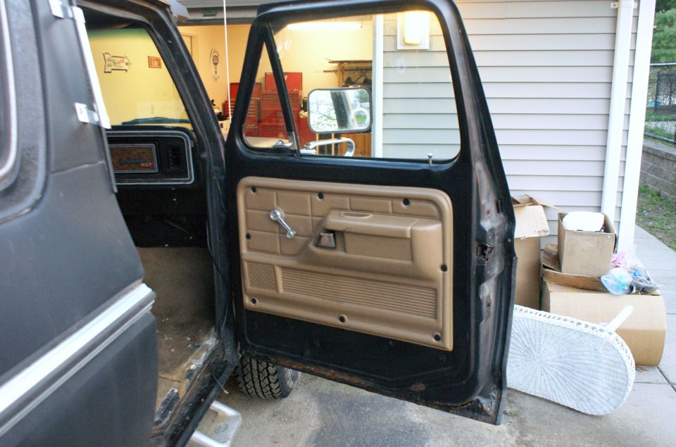 1979 Ford Bronco interior door panel and dashboard view from outside