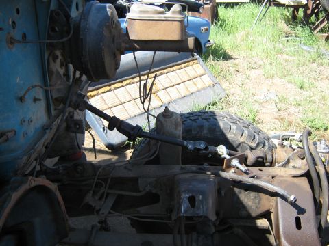 1972 Ford F-250 - Close-up view of the steering column and brake booster on a 1972 Ford F-250 truck.