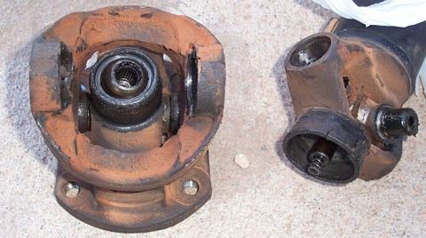 1990 Ford Bronco - On the left you see the centering ball and needles within. On the right you see the post that rides on the needles, and the spring in the p…