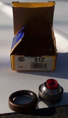1990 Ford Bronco - New centering ball, Napa part #612.... but that seal (on the lower left) does not work. Call a competent driveline shop and find a better s…