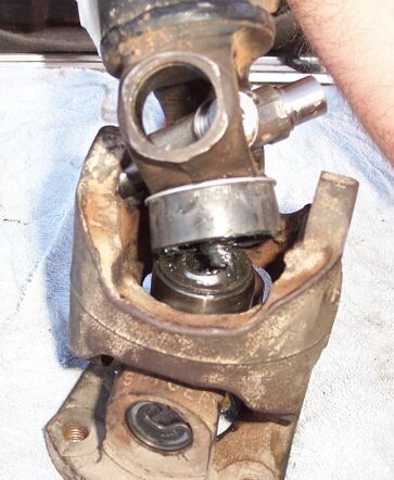 1990 Ford Bronco - THIS IS THE HARDEST PART. You must drop the post and spring into the centering ball without disturbing any needles. Note you must have NO c…