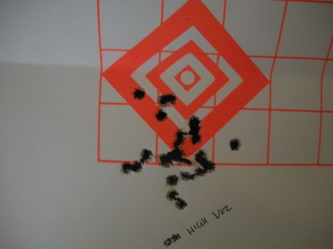 1996 Ford Bronco - Target practice results show bullet holes clustered near the center.