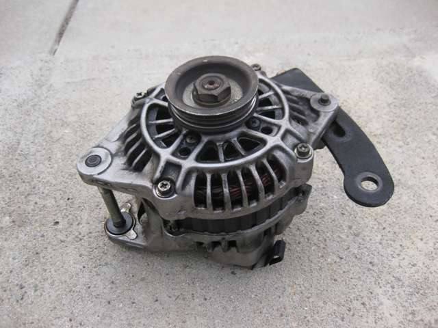 Alternator with pulley on concrete