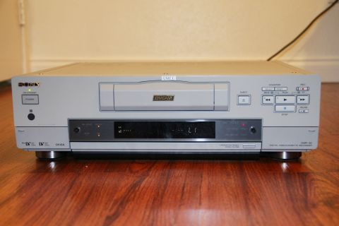 1993 Ford Taurus - A Sony DVCAM digital videocassette recorder is shown from the front, placed on a wooden floor.