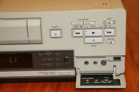1993 Ford Taurus - Close-up of VCR controls, including playback and recording buttons, and audio input jacks.
