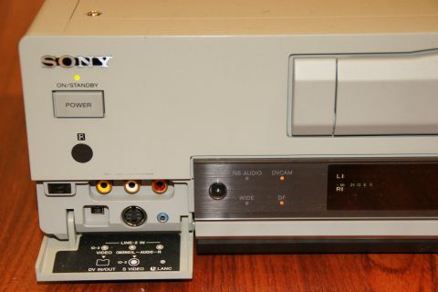 1993 Ford Taurus - Close-up of a Sony DVCAM video recorder, showing its input/output connections and controls.