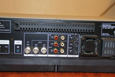 1993 Ford Taurus - The rear panel of a Sony Digital Videocassette recorder displays numerous input and output ports for audio and video connections.