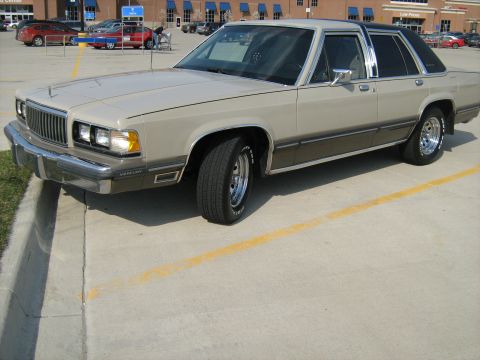1988 Mercury Grand Marquis - This 1988 Mercury Grand Marquis sedan has a two-tone paint scheme and chrome wheels.