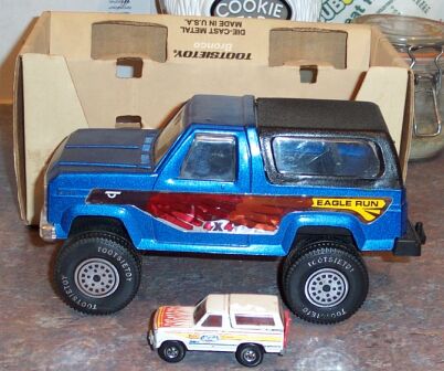 1990 Ford Bronco - Just a couple of my diecast Broncos. IME the larger one (TootsieToy) is somewhat rare