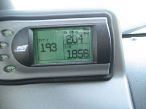2004 Ford F-150 - Close-up of an Edge digital gauge displaying engine temperature and RPM readings.