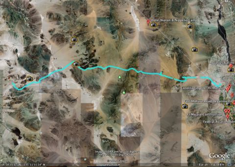 1996 Ford C-350 (Centurion Conversions) - This satellite image displays a route marked in blue across a desert terrain, with several points of interest indicated.