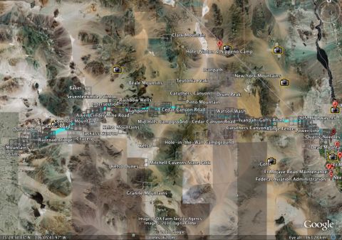 1996 Ford C-350 (Centurion Conversions) - This satellite image shows a vast desert region with numerous geographical landmarks and man-made structures identified.