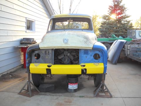 1954 Ford F-100 - This 1953 Ford F-100 truck is in a state of restoration, with its front end disassembled.