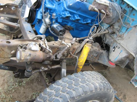 1972 Ford F-250 - Detail view of engine and suspension components, likely during a rebuild or restoration project.