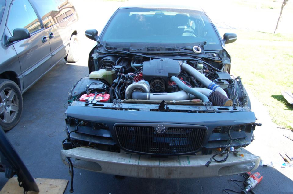 1985 Mercury Grand Marquis front with engine exposed and grille visible