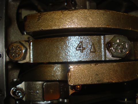 1979 Ford Bronco - This image shows a close-up view of engine crankshaft bearing caps, not a 1979 Ford Bronco.