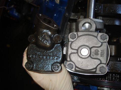 1979 Ford Bronco - A comparison of an old, used oil pump with a new replacement part.