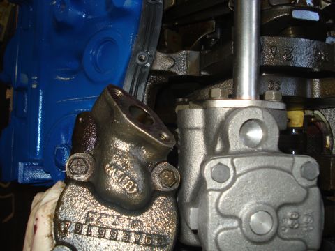 1979 Ford Bronco - Engine components, likely from a Ford vehicle, are shown in this close-up view.