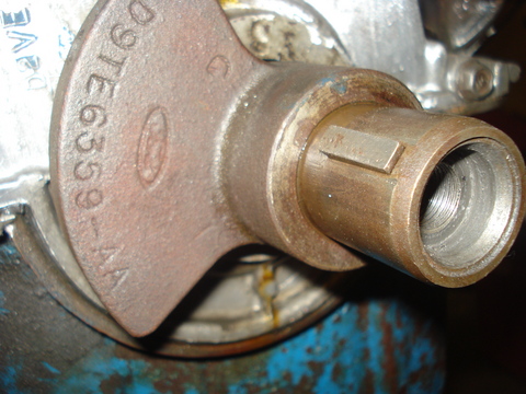 1979 Ford Bronco - This image shows a close-up of a rusty Ford engine component with part number D9TE6559-AA visible.