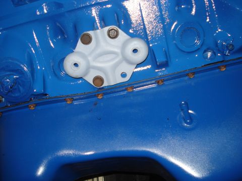 1979 Ford Bronco - Bracket attached to a freshly painted blue engine block.