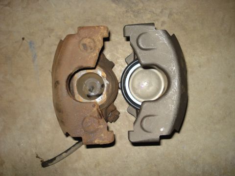1979 Ford Bronco - A comparison between a rusty old brake caliper and a new one, likely for a Ford F350.