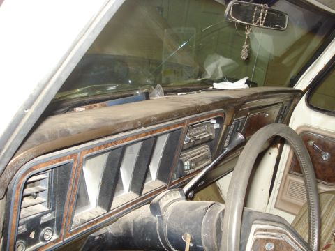 1979 Ford Bronco - Interior view of a 1979 Ford Bronco, highlighting the dashboard and its woodgrain accents.