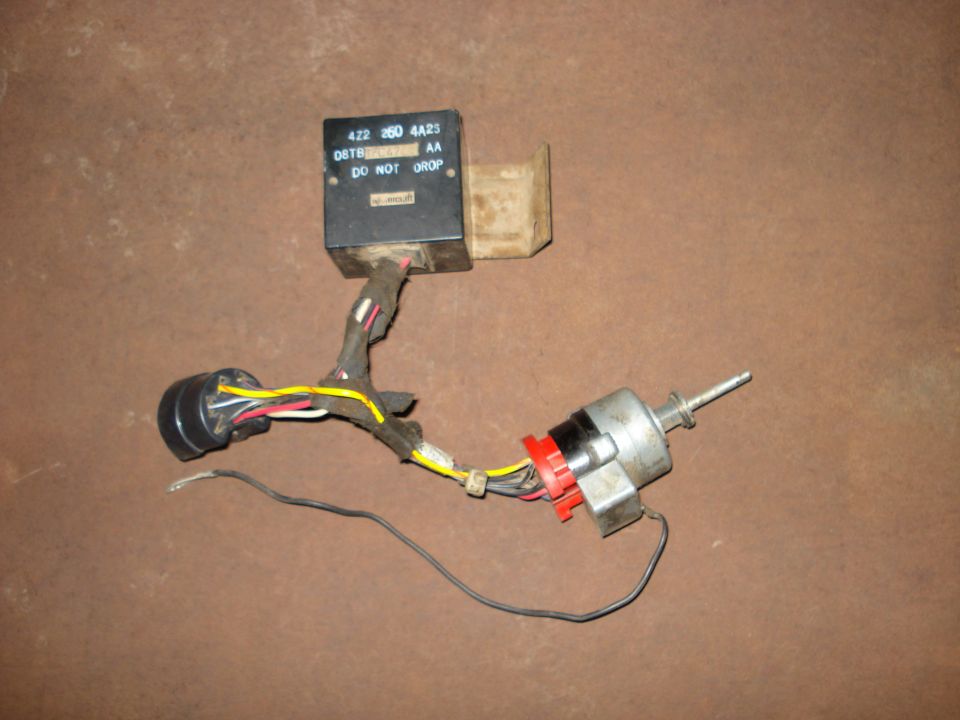 Ignition switch and relay with wiring harness. Black box has '422 260 4A25' and 'DO NOT DROP' printed on it