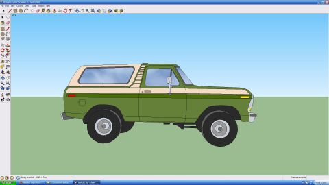 1979 Ford Bronco - A SketchUp 3D model screenshot showing the side profile of a two-tone green and tan Ford Bronco SUV against a green ground and gray sky bac…