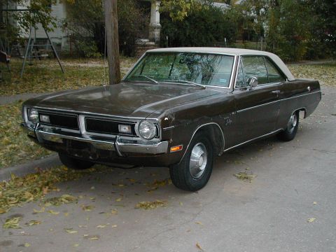 1971 Dodge Dart - This 1971 Dodge Dart Swinger is seen from a 3q-front angle, parked on a street with fallen leaves.