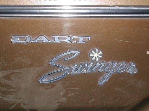 1971 Dodge Dart - Close-up of the 'Dart Swinger' emblem, indicating a 1971 model year.