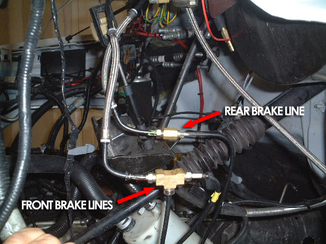 Front and rear brake lines labeled with red arrows