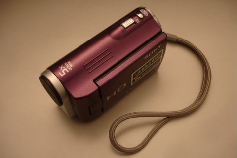 1993 Ford Taurus - A purple Sony Handycam camcorder is shown with its wrist strap.