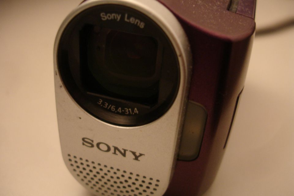 Purple Sony Handycam camcorder with silver front panel and lens