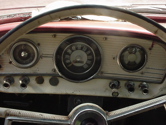 1962 Ford F-100 dashboard showing speedometer, fuel gauge, and other controls