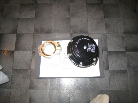 2007 Subaru Impreza - TiAL Sport external wastegate and V-band flange shown with included diagram.