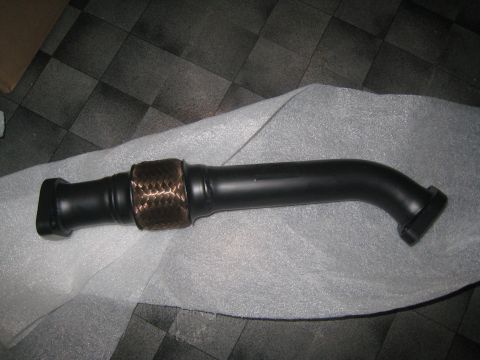 2007 Subaru Impreza - A black exhaust pipe with a braided flex section and a flange is shown, likely an aftermarket part.