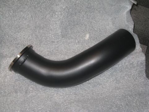2007 Subaru Impreza - A black exhaust pipe with a flange is shown against a gray, textured background.