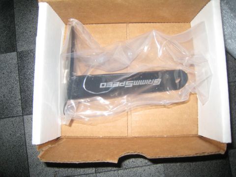 2007 Subaru Impreza - A Grimmspeed branded part is shown inside its packaging within a cardboard box.