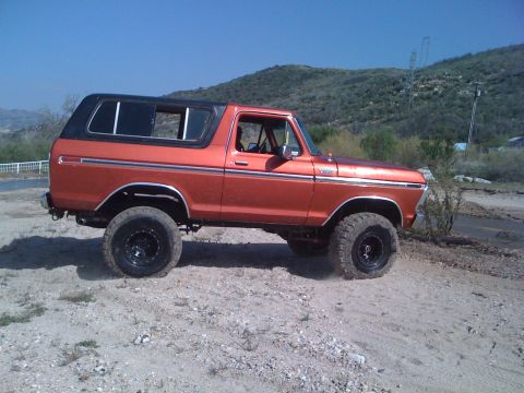 1978 Ford Bronco - This lifted 1978 Ford Bronco is shown in a side profile, ready for off-road adventures.