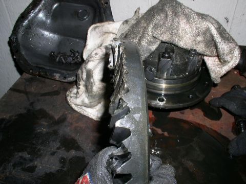 1979 Ford Bronco - Close-up of a severely damaged differential ring gear, suggesting catastrophic failure.