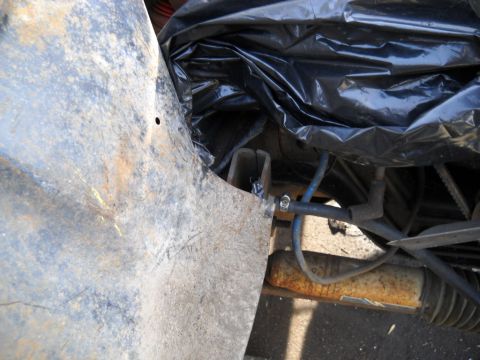 1954 Ford F-100 - The little problem with the passenger side is an aftermarket steering stabilizer bracket. I just pried the inner fender panel out out to cl…