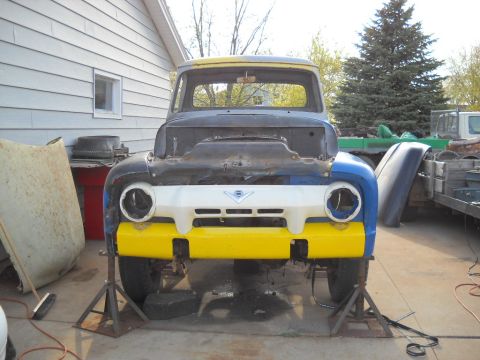 1954 Ford F-100 - Next I bolted in the front valance and then bolted in the grille. The truck now has it's fangs! :lol: